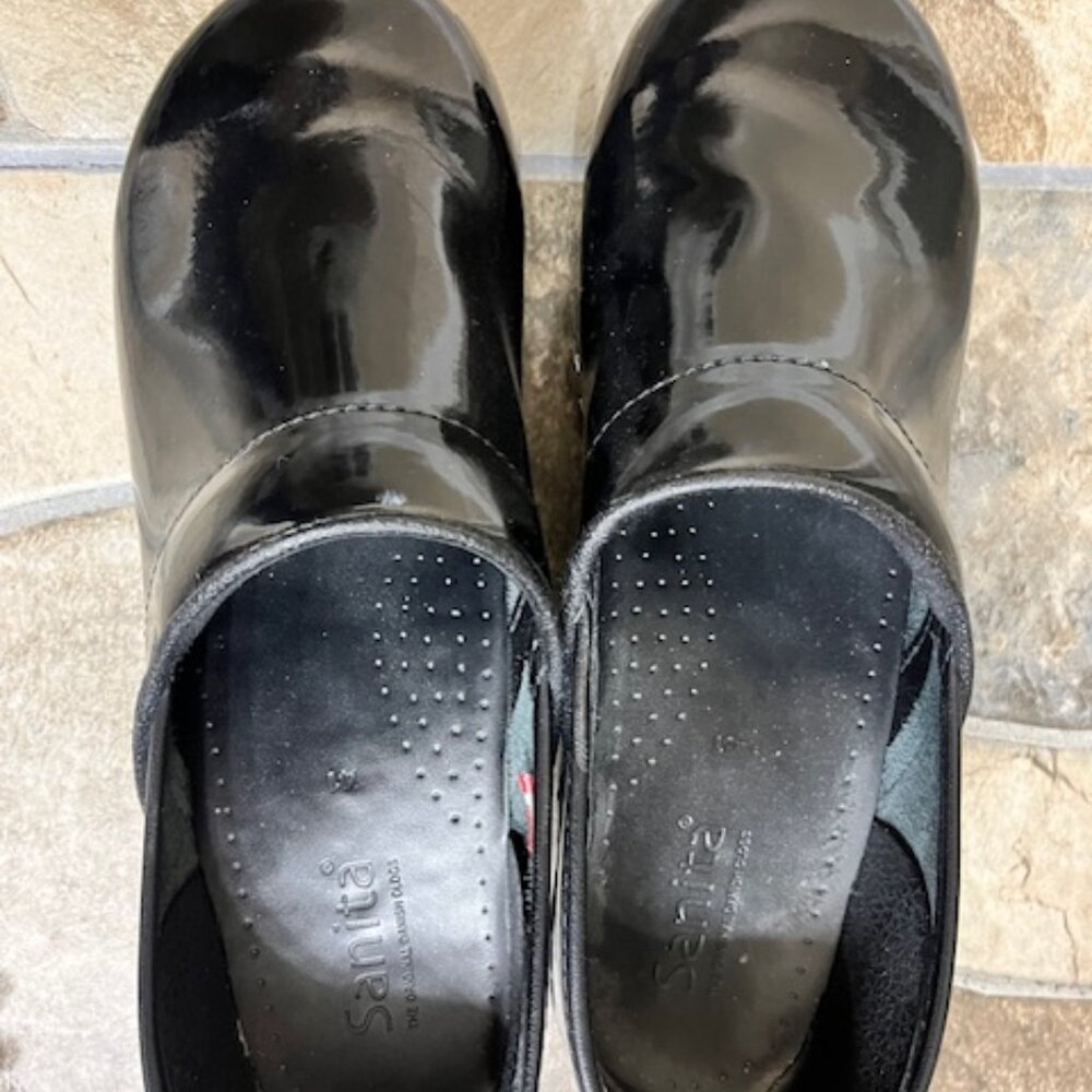 Black patent leather clogs, size 11